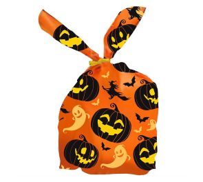 Oranssi karkkipussi jossa halloweenteemaisia kuvioita