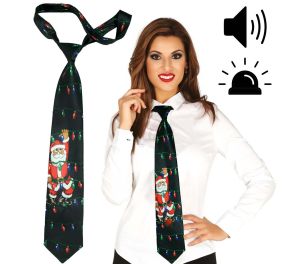 Mustanvihreä solmio, jossa kuva missä joulupukki kiipeää jouluvaloja pitkin. Naisella on solmio kaulallaan. Mustat merkit missä kerrotaan, että solmiossa on valo ja ääni.