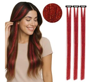 Punaiset, glitter-hiuslisäkkeet naisella hiuksissaan. Kolme lisäkettä irrallaan kuvassa, ja lähikuva kuidusta.